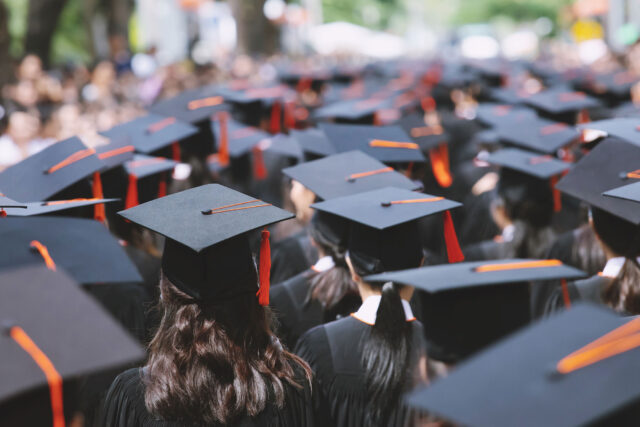 photo - Group of graduates during commencement