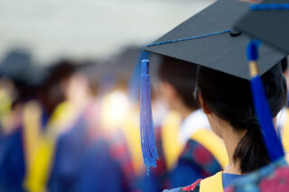 photo - Rear View of Graduates during Commencement