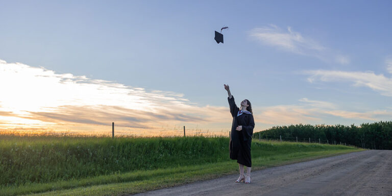 photo - Graduate Cap Throw on Rural Road