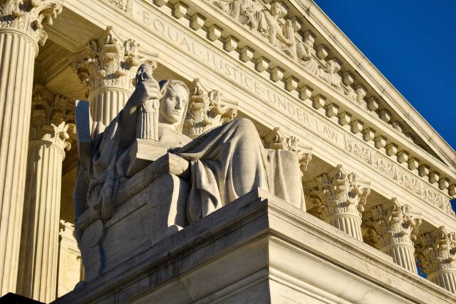 photo - Statue Outside the Supreme Court