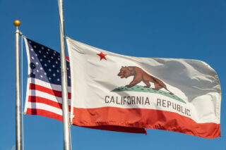 photo - California and US Flags on Poles Side by Side