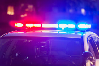photo - Lights on Top of Police Patrol Car