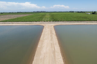 photo - Water Diverted onto Newly Constructed Groundwater Recharge Basin in Fresno County-pixels-ca-dwr-2024_05_13_XM_0102_Groundwater_Recharge_DRONE