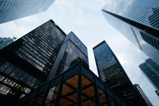 photo - Low Angle Photo of City High Rise Buildings During Daytime