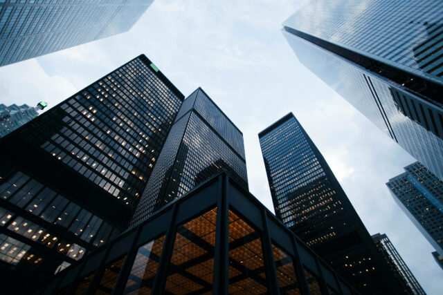 photo - Low Angle Photo of City High Rise Buildings During Daytime