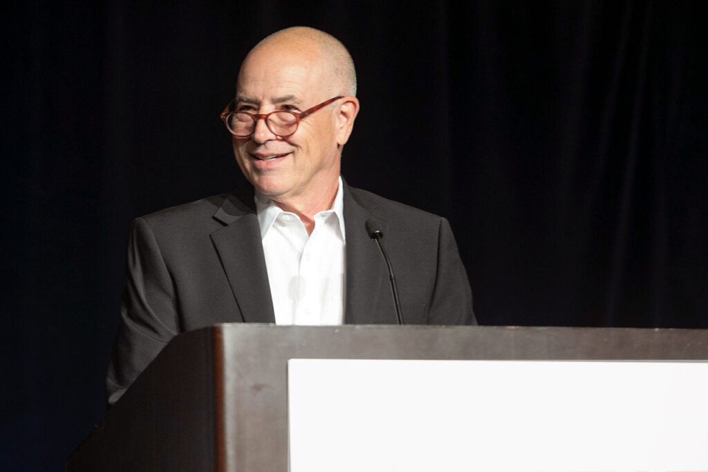 David Traversi welcomes the audience