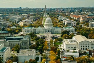 photo - Aerial View of US Capitol, Supreme Court Building, Library of Congress and the National Mall in Washington DC