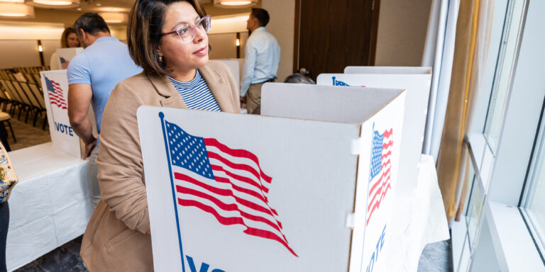 photo - Woman Voting in an Election