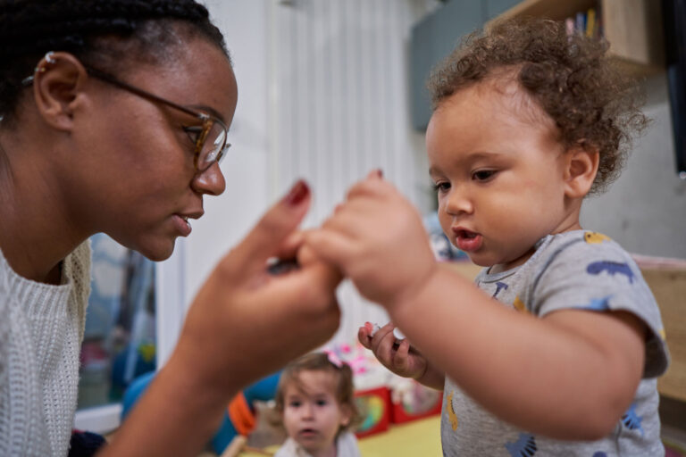 photo - Baby Boy Holding Mother's Hand