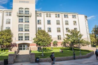 photo - UCLA Residence Hall Exterior with Students in Front