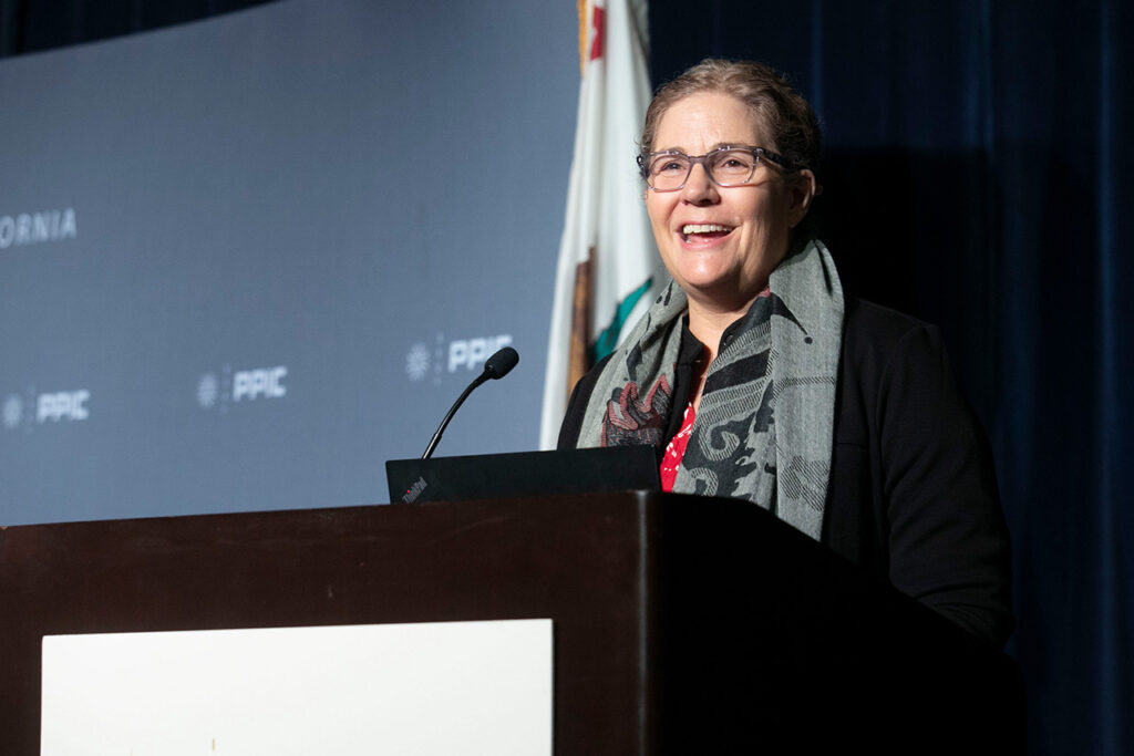 photo - Letitia Grenier welcomes the audience