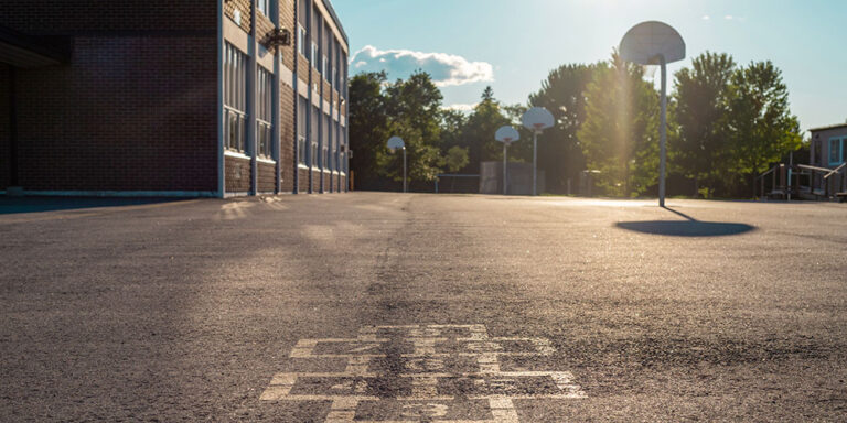 School Building and School Yard in the Evening