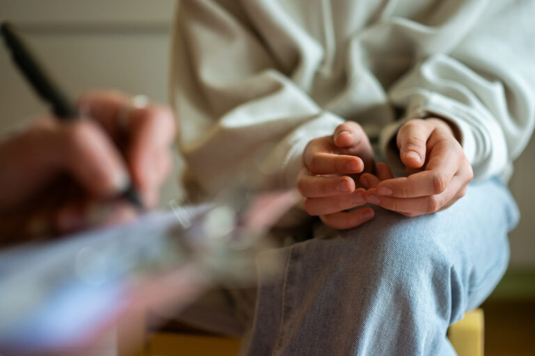 photo - Close up of therapy session with teenage girl