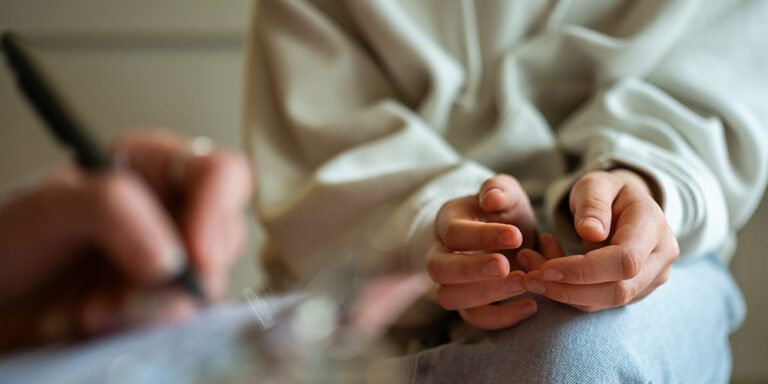 photo - Close up of Therapy Session with Teenage Girl