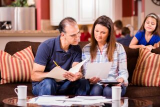 photo - Family paying Bills at Home