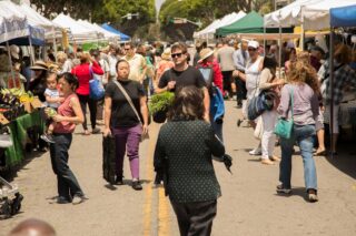 photo - People Walking in Santa Monica Street Market