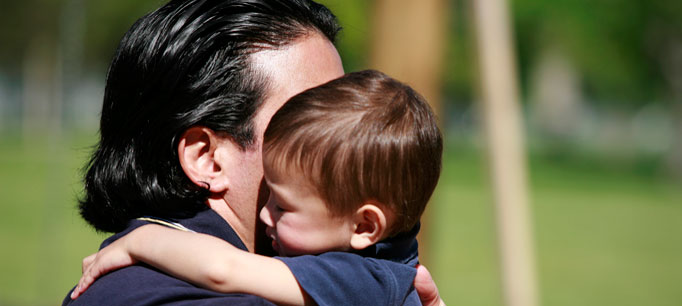 photo - Father and Son Hugging