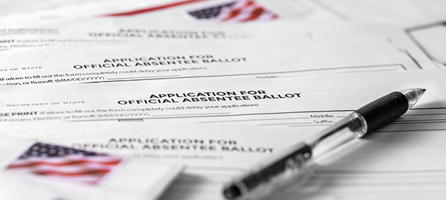 photo - Application for Absentee Ballot, Pen, and Stamps