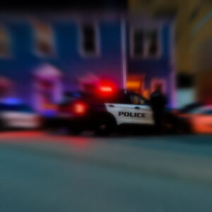 photo – Blur Background of Police Cars at Night
