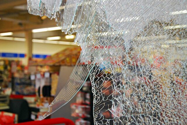 photo - Broken Window of Shop