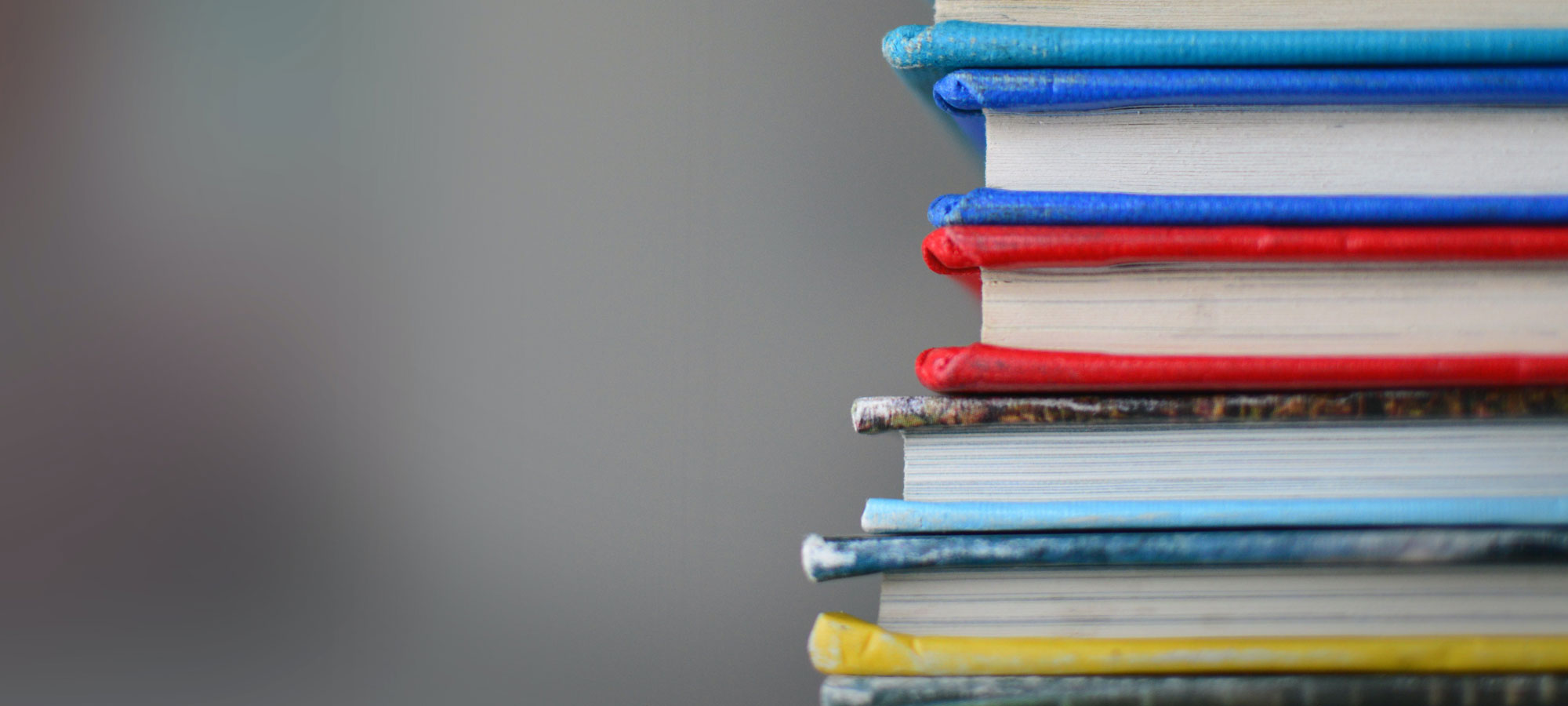 photo - Close up of Stack of Books