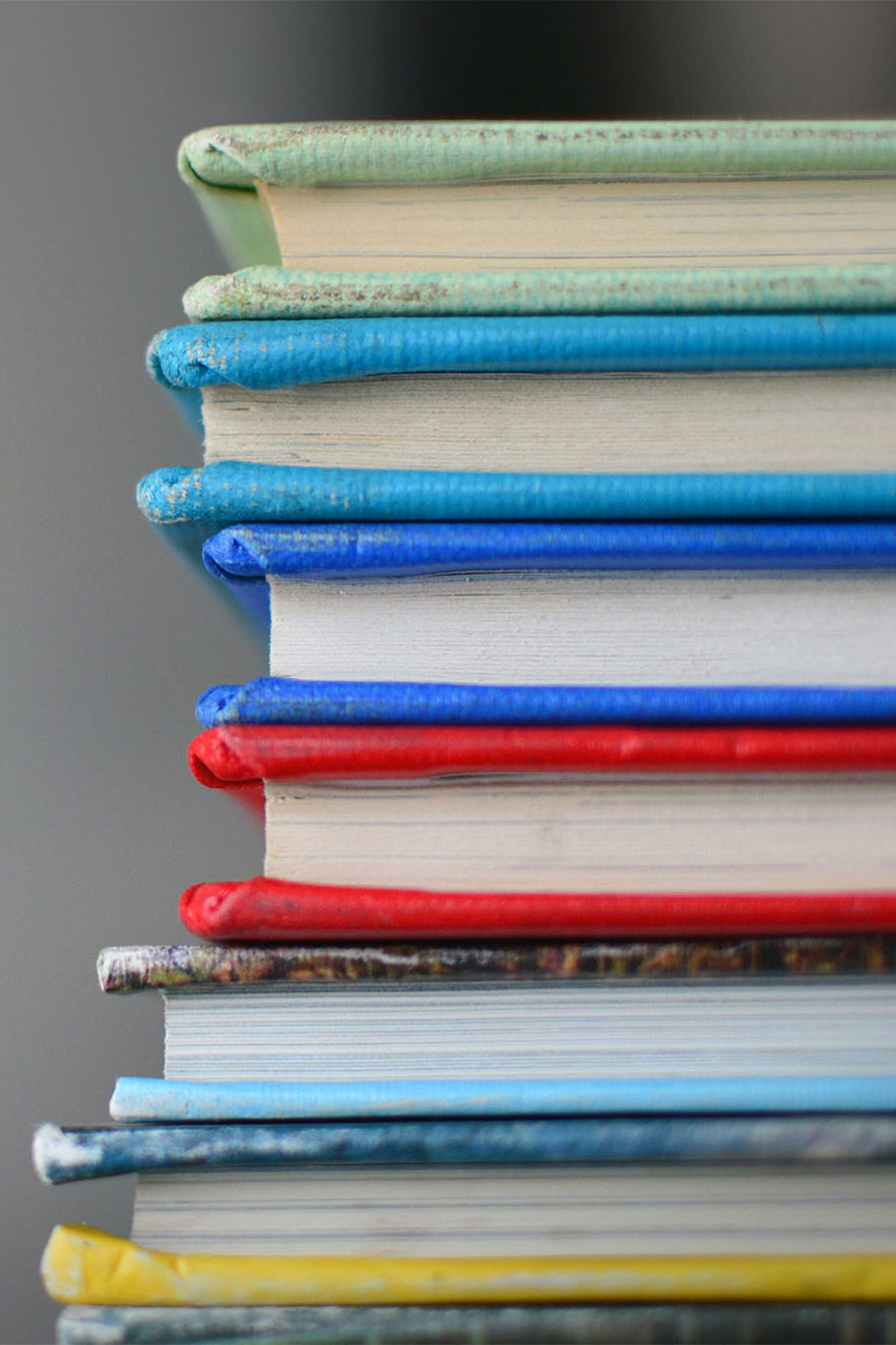 photo - Close up of Stack of Books