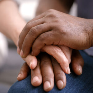 photo - Couple Holding Hands for Support and Help