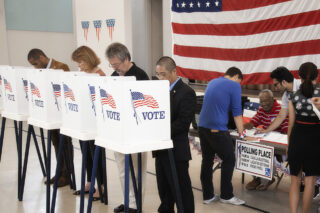 photo - people voting in polling place