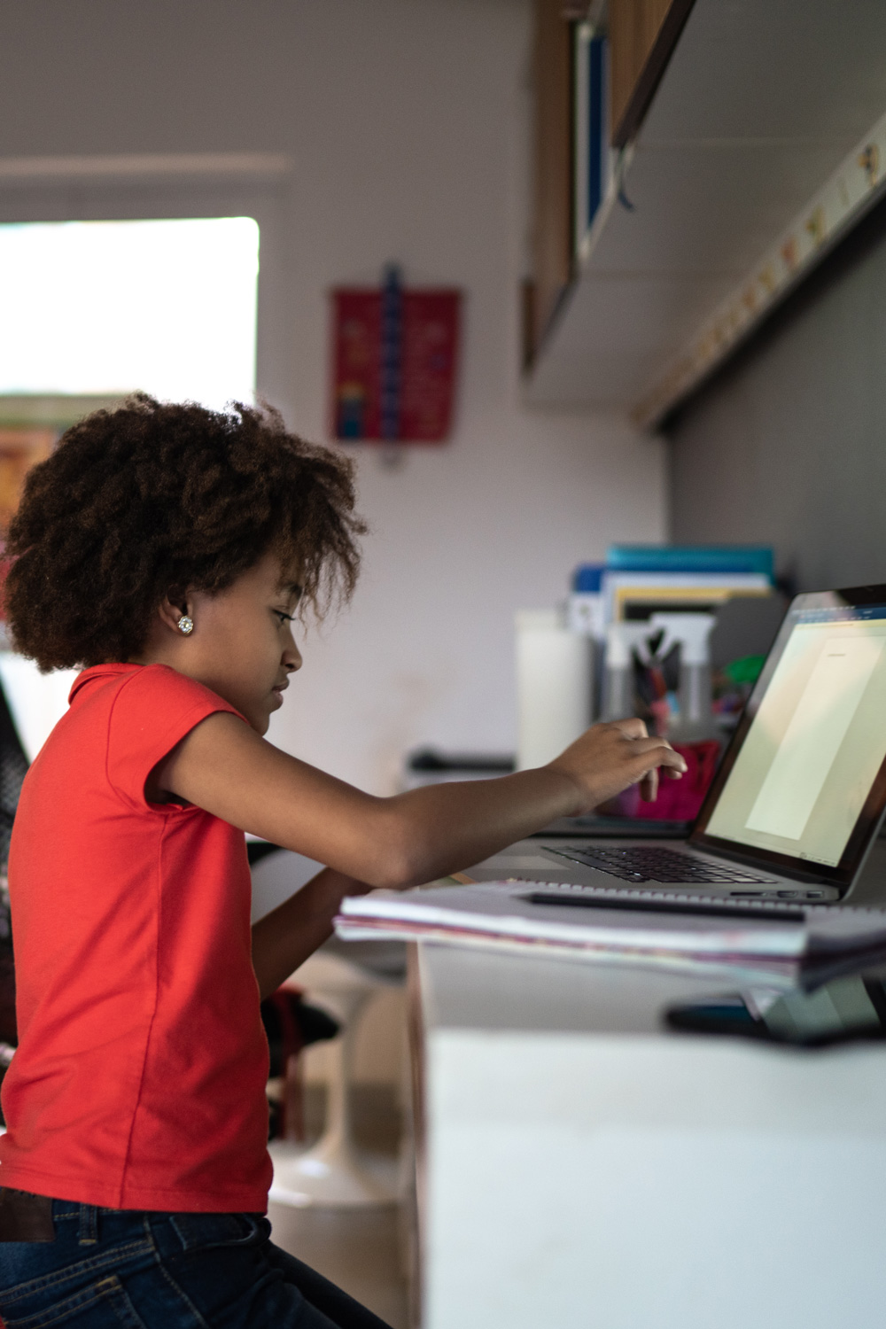 photo - Elementary Girl Studying on Laptop