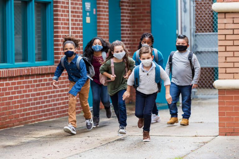 photo - Elementary Students Leaving School and Wearing Masks