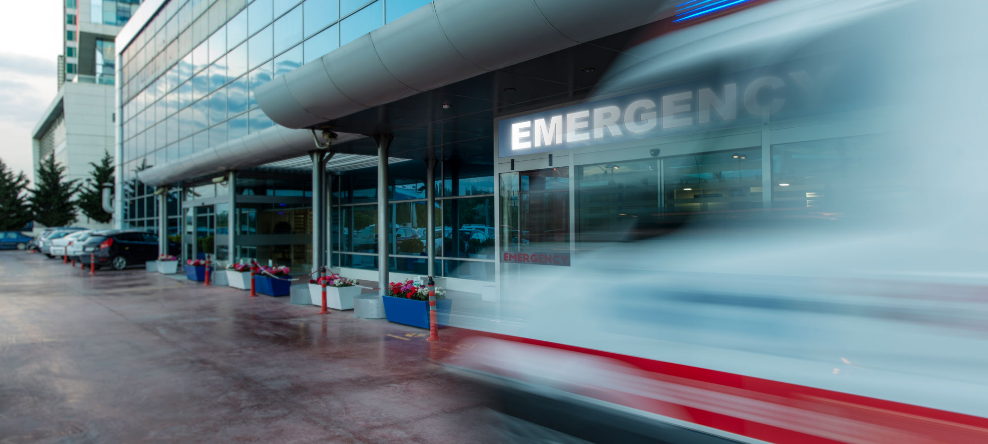 photo - Emergency Room Door with Ambulance Moving By
