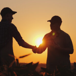 photo - Farmers Shaking Hands in Field
