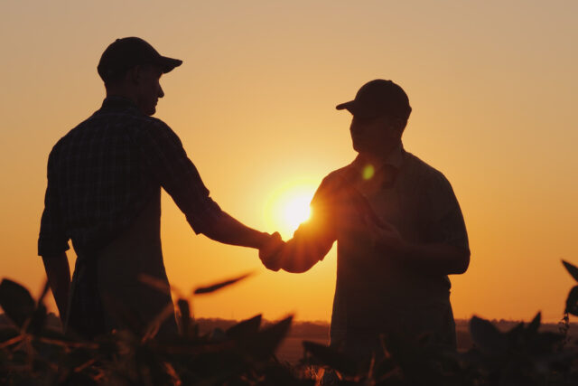 photo - Farmers Shaking Hands in Field