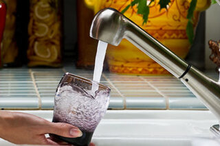photo - Filling Water Glass at Kitchen Sink, Pixel CA DWR