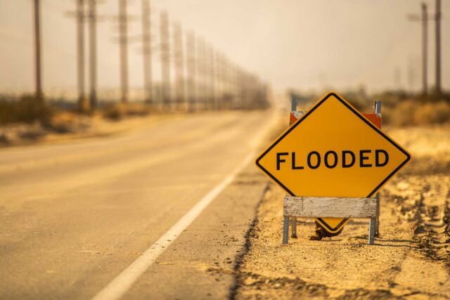 photo - Flooded road warning sign