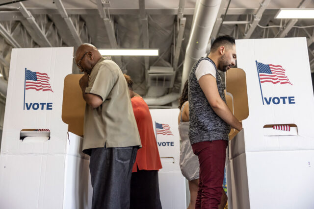photo - Four People Voting