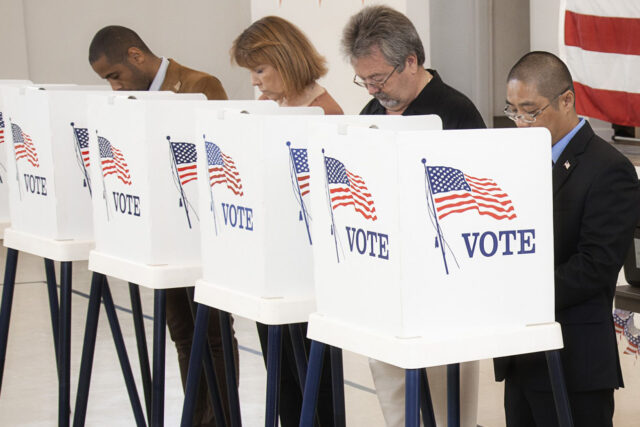 photo - People Voting in Polling Place