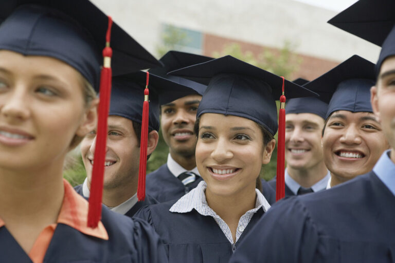 photo - Graduates Smiling at Graduation