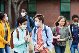 photo - Group of students outside school with masks