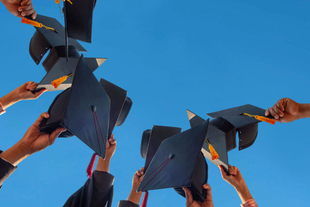photo - Mortar Boards Held Up High