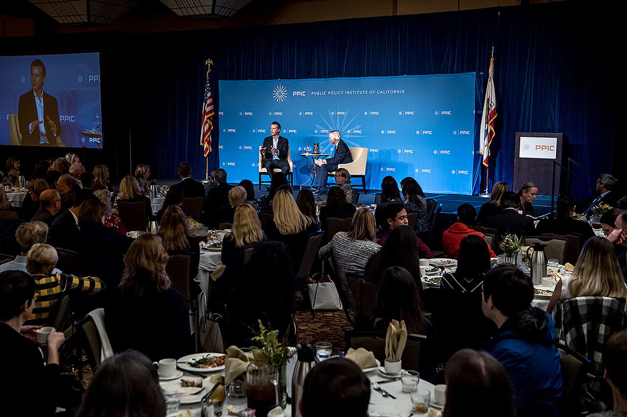 Photo of Governor Newsom and Mark Baldassare with the audience