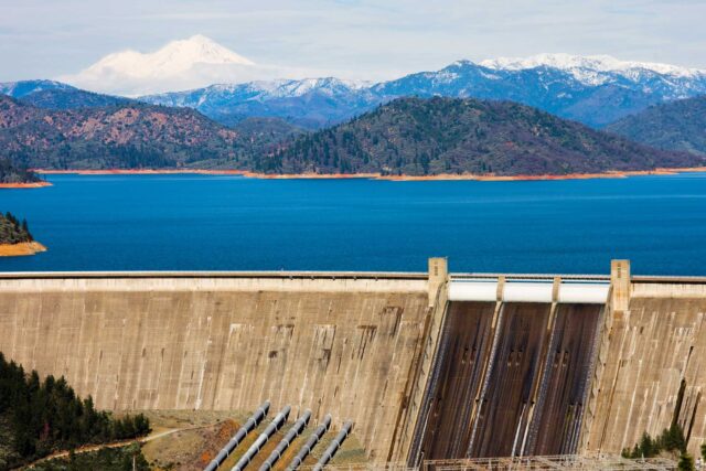 photo - Shasta Dam with Mountains in Background