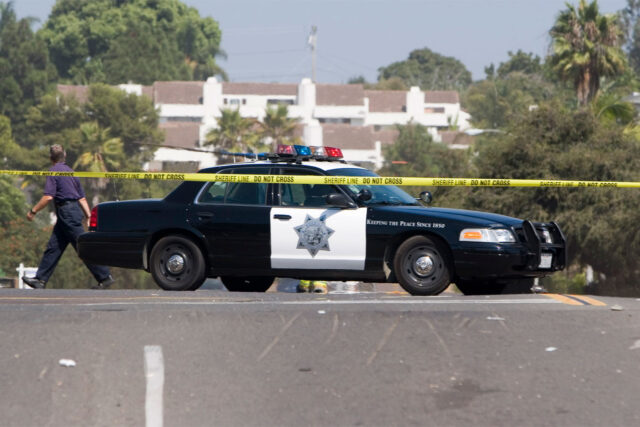 photo - Sheriff Line Do Not Cross with Police Car on California Residential Street