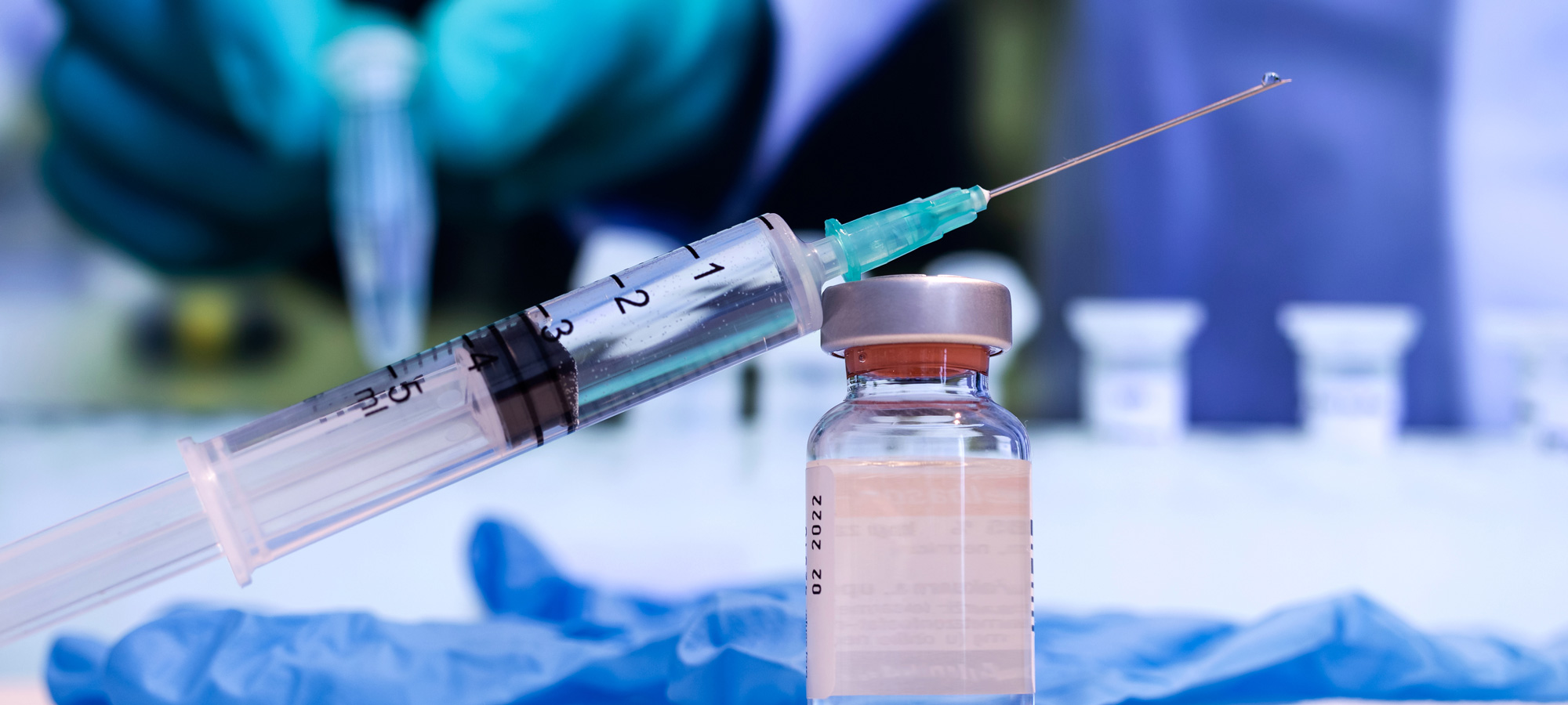photo - Syringe and Vaccine Vial