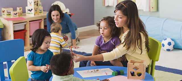 photo - Teachers and Toddlers in Daycare