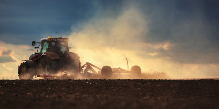 photo - Tractor Preparing Land for Planting