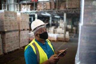 photo - Warehouse Worker Checking Products