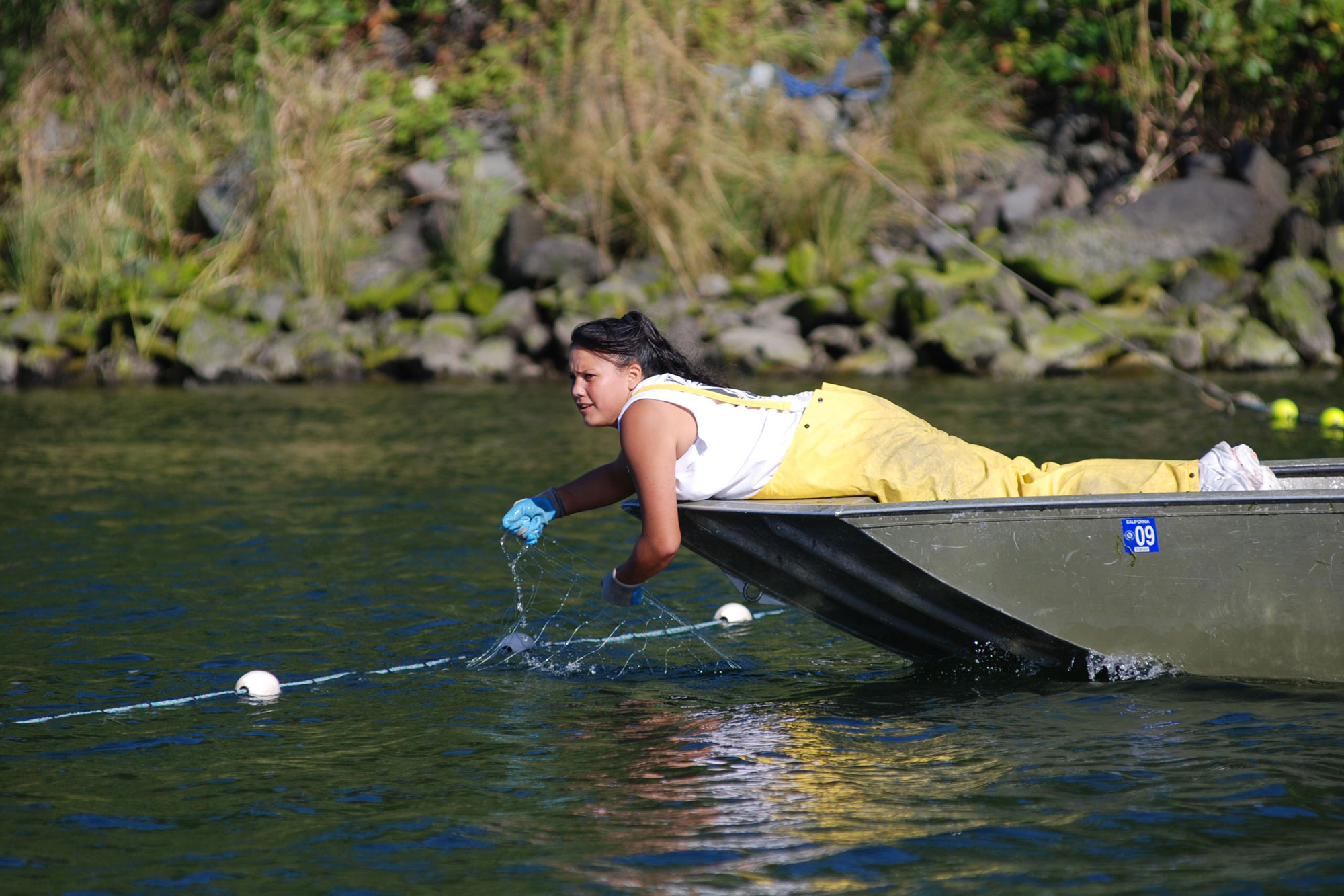 photo - woman in boat managing klamath river
