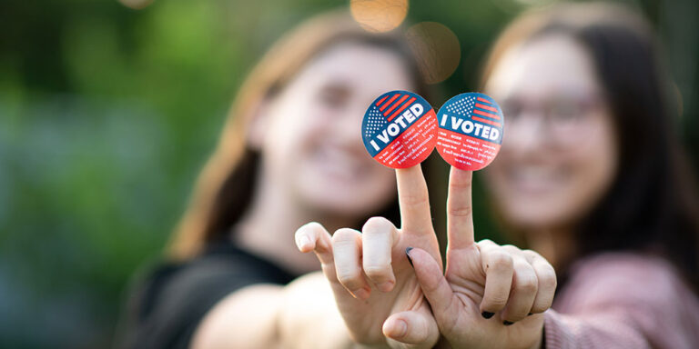 photo - Young People Wearing I Voted Stickers